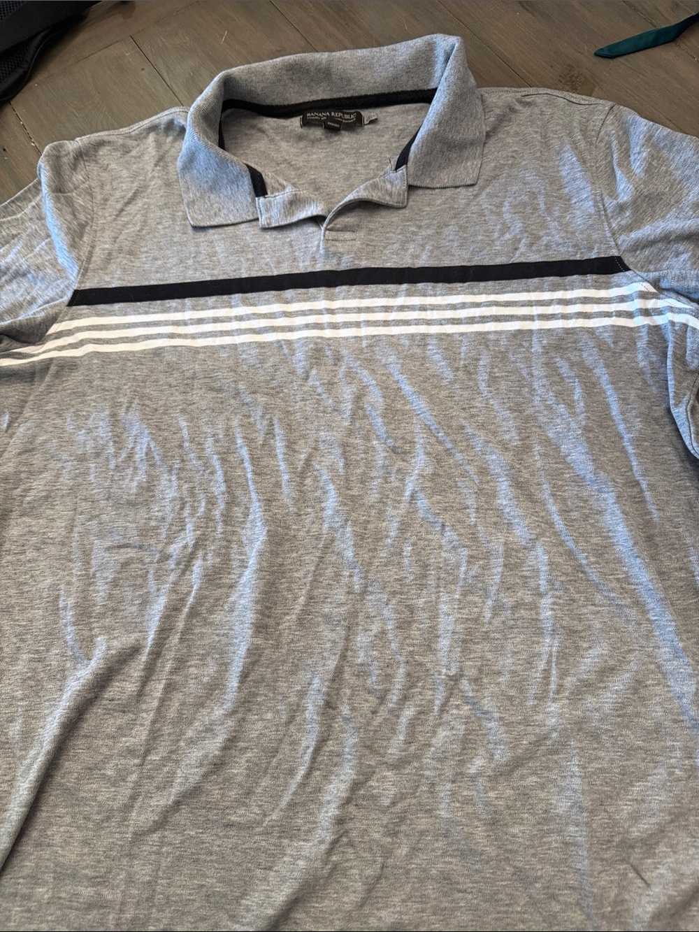 Banana Republic Men’s Heather Gray Polo with Black & White Stripes
Large